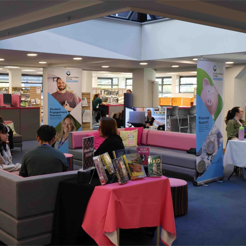 a Library set up with different pop-up banners and people throughout