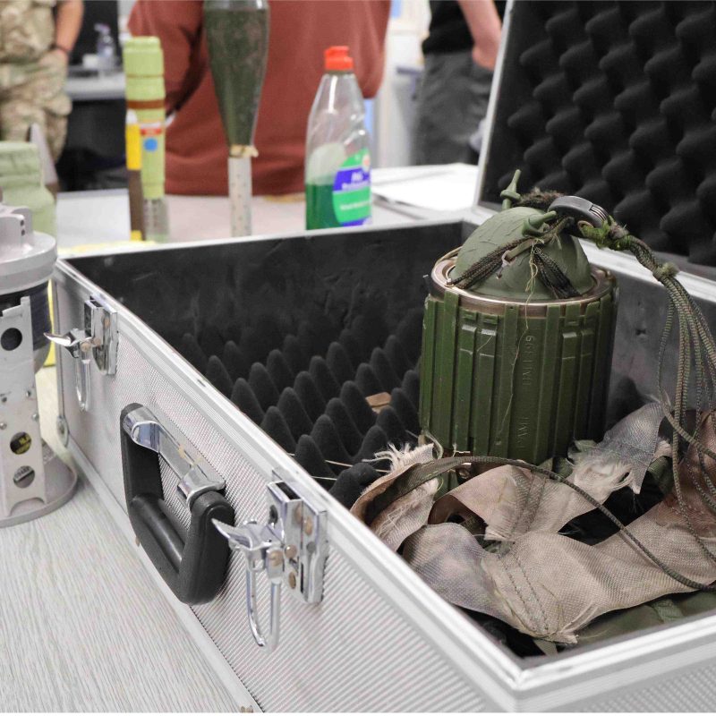 A table full of various army equipment.