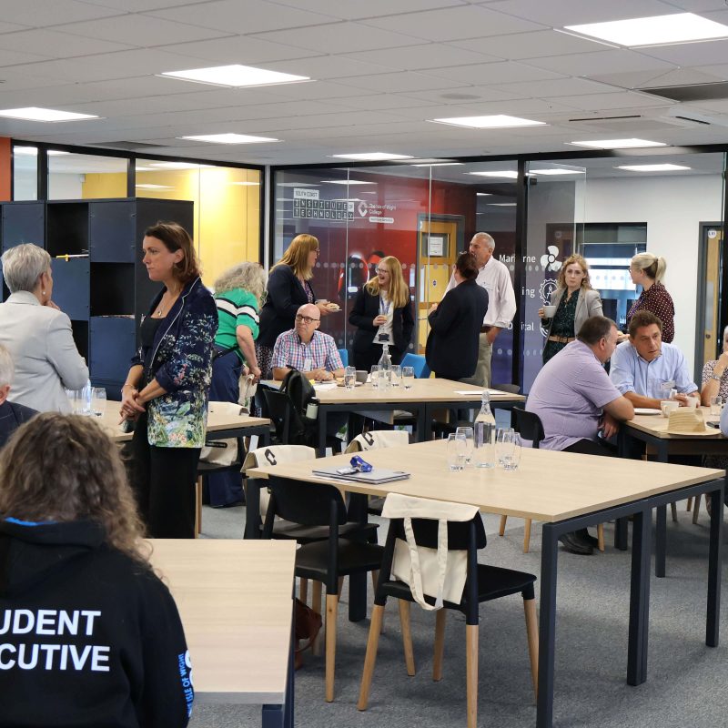 Students, Councillors and College Staff members all mingle during breakfast