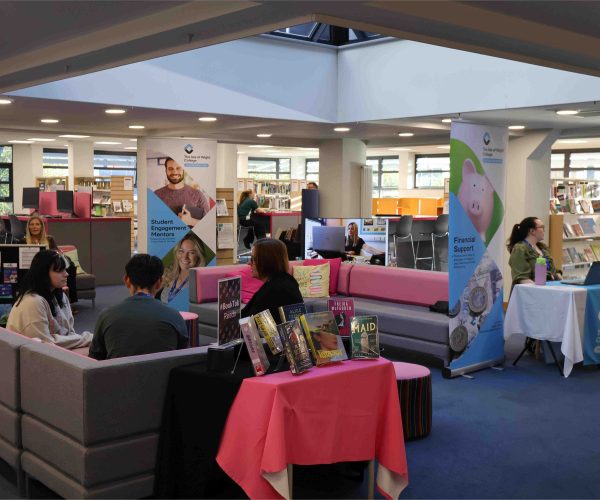 a Library set up with different pop-up banners and people throughout