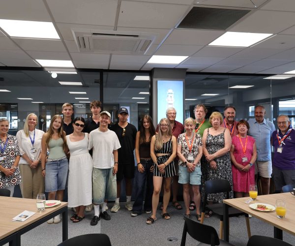 Students, lecturers and Councillors pose for a group photo